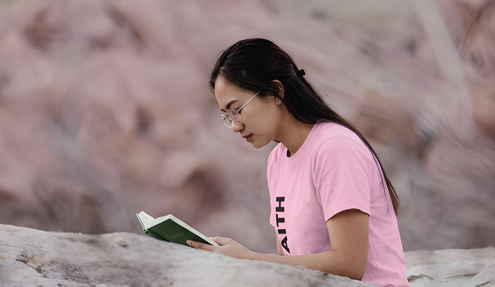 Model wearing a pink shirt